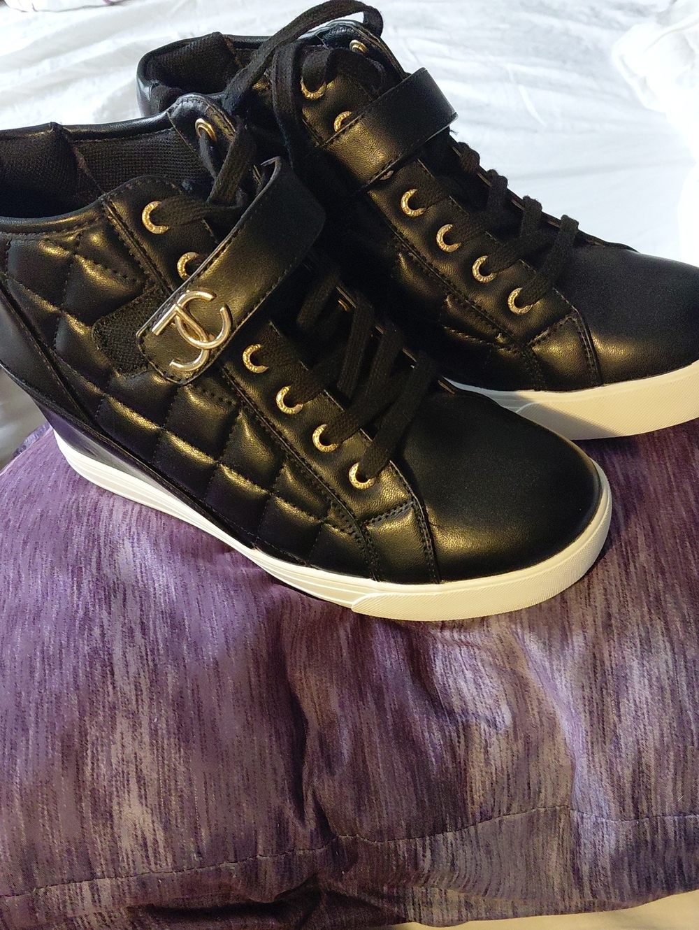 Juicy Couture Black Quilted High-Top Wedge Sneakers with Gold Accents